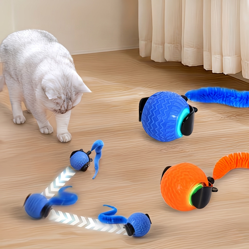 Pelota interactiva inteligente para gatos con cola y luces LED, gato observándola