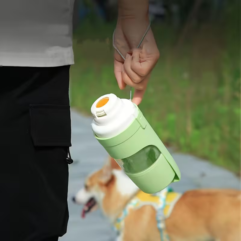Botella portátil 2 en 1 para mascotas en color amarillo, con medidas 29x9cm