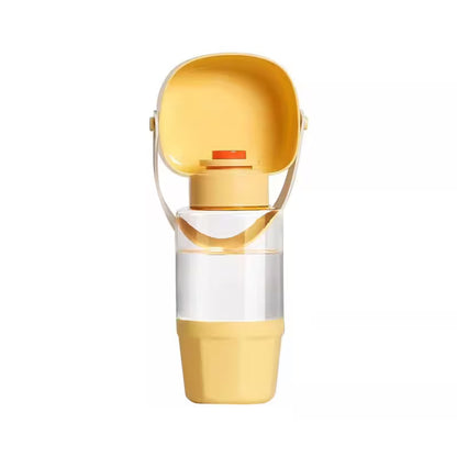 Botella antigoteo para mascotas en color crema, con cuenco plegable abierto